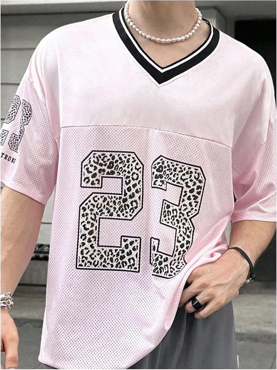 WDIRARA Men's Cheetah Letter Graphic Tees Oversized V Neck Short Sleeve Jersey T Shirt Tops